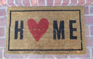 Welcome mat that says HOME
