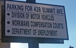 Parking lot sign with obvious typos