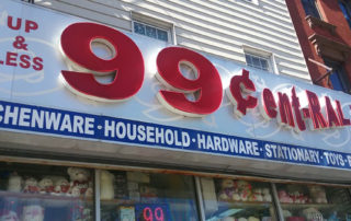 Sign "99 cents and up and less"