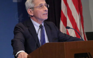 photo of Dr. Anthony Fauci at a podium