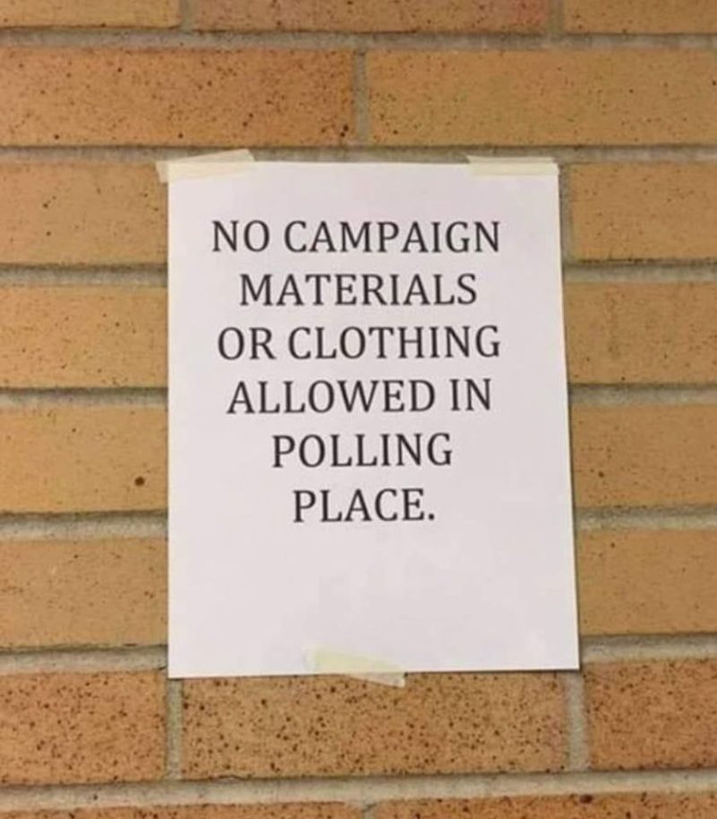Printed sign saying No campaign materials or clothing allowed in polling pl...